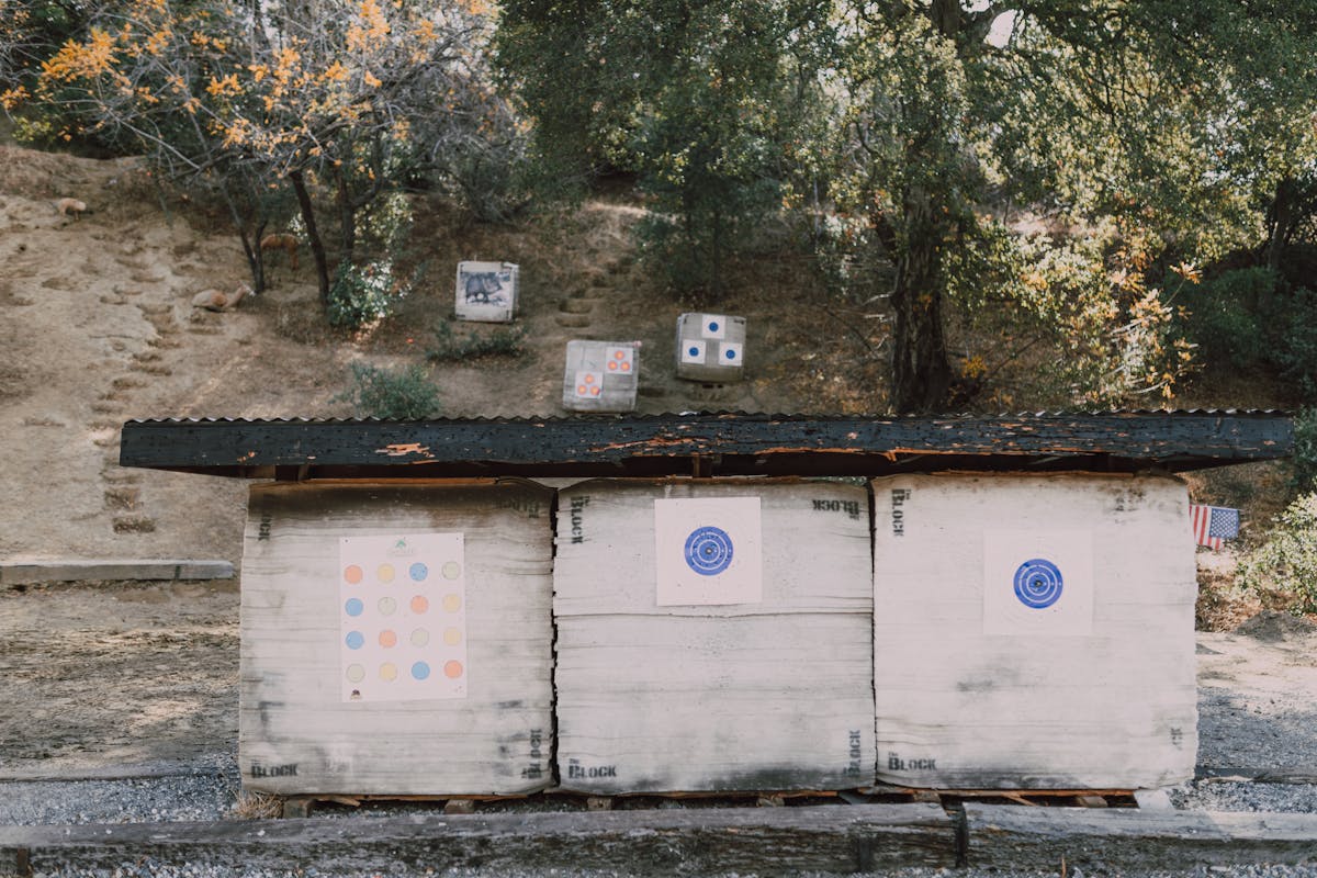Outdoor home shooting range with covered backstop and target placements — built by C4 Landscaping